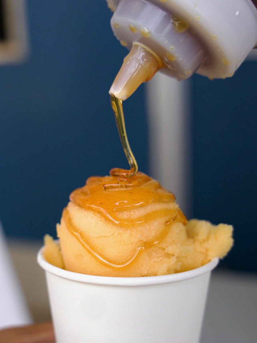 Drizzling honey over slush